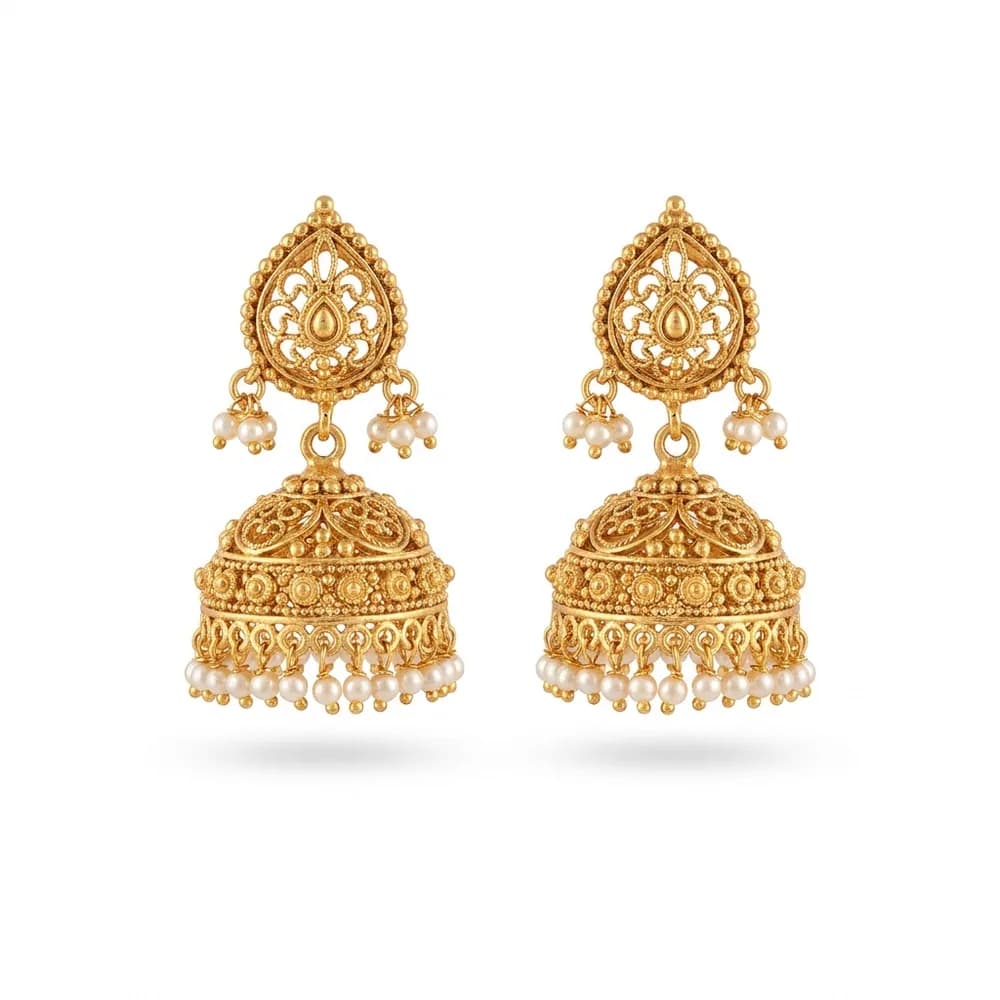 A seller’s original jhumka earring photo on a plain white background, before any editing